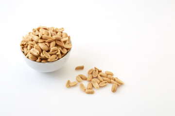 Roasted peanuts and salt in a bowl