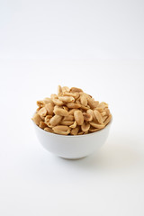 Roasted peanuts and salt in a bowl