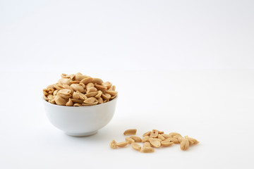 Roasted peanuts and salt in a bowl