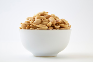 Roasted peanuts and salt in a bowl