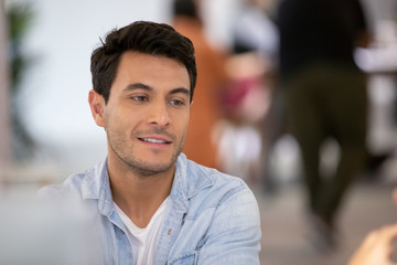 Fototapeta premium portrait of a handsome young man in office