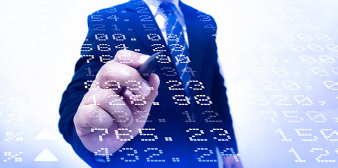 suit businessman touch analysis data on transparent screen