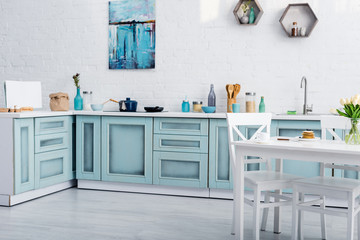 delicious pancakes on table prepared for breakfast in kitchen