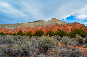 Kochorme State Park Utah with two toned rock mountain and dirt path