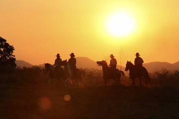 cowboy and horse  at first light,mountain, river and lifestyle with natural sunset light background