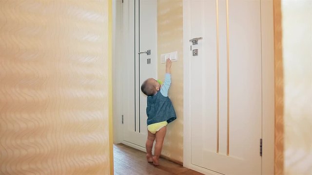 Little girl turns off the bathroom light and the toilet HD 1920x1080p