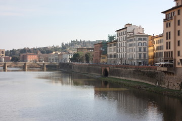 Tuscan middle bridge on the Florence canal on an Italian spring day