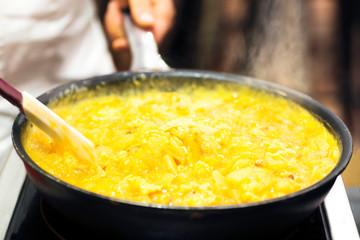 spanish omelette in skillet frying pan