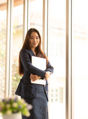 Young business woman with modern office ,nature background