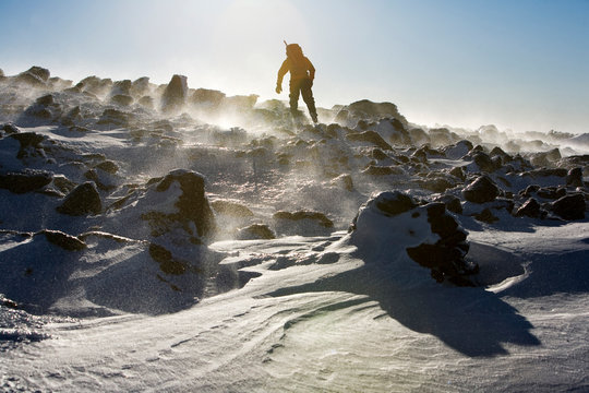 Ryan Buckley, Summit Intern hikes the northwest area of Mt. Washington's summit cone during some time off from his work.