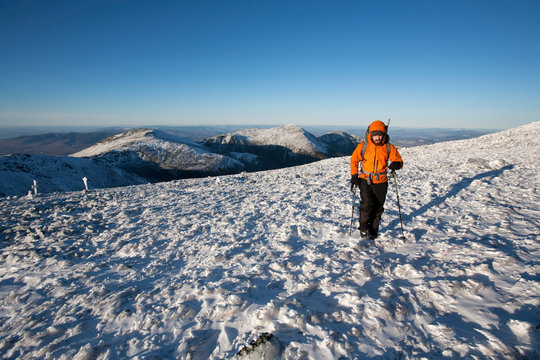 Ryan Buckley, Summit Intern hikes the northwest area of Mt. Washington's summit cone during some time off from his work.