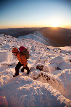 Ryan Buckley, Summit Intern hikes the northwest area of Mt. Washington's summit cone during some time off from his work.