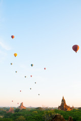Hot air balloons fly over Bagan temples