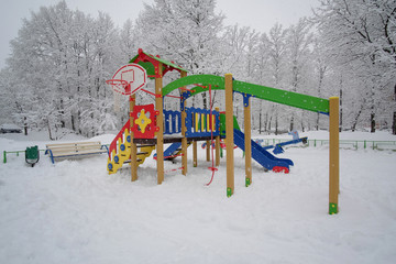 Children's playground on a winter day.