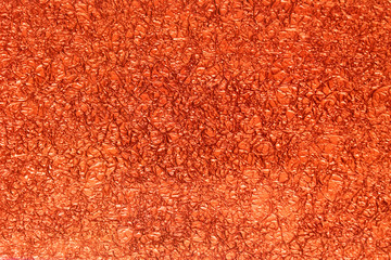 Fototapeta premium Abstract red crumpled paper background with place for text.