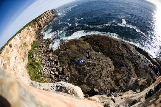Australian BASE jumper Ben Gibbs glides his parachute to a landing in Sydney, New South Wales, Australia.
