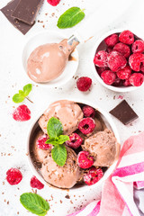 Chocolate ice cream with raspberries.