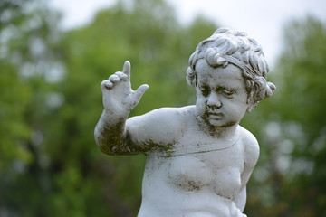 statue of angel in garden