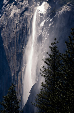 A seasonal waterfall that flows in the winter and spring, Horsetail Fall, is located on the east side of El Capitan in Yosemite National Park, California.