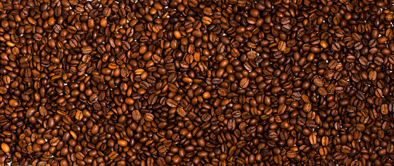 Background of roasted coffee beans. Close up