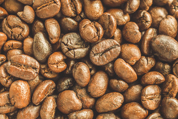 Roasted coffee beans closeup texture background