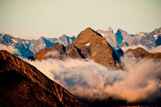 Hozomeen Mountain, located in Washington, USA, pokes out above the clouds as seen from Frosty Peak, north of the Canada-USA border.