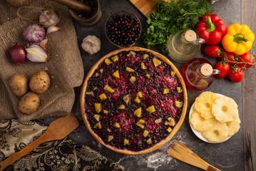 Sweet pizza with berries and pineapple