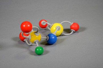 Molecule model of Alum KAl(SO4)2. Yellow is suphur, red is oxygen, green potassium. (anhydrate)