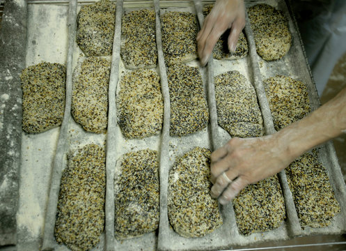 The morning rush is on at the Eric Kayser bakery on Rue Malesherbes in Paris, France.  (releasecode: CM_MR1007)