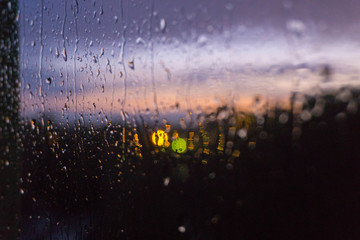 raindrops on the window in the evening