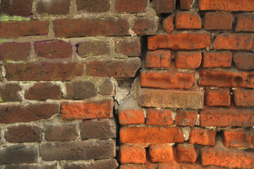 Red old worn brick wall texture background. Cracked brick wall.