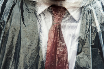 Plastic covering mans suit