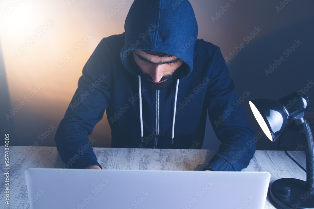 Poster hacker hand keyboard on the desk
