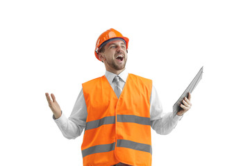 The builder in a construction vest and orange helmet standing on white studio background. Safety specialist, engineer, industry, architecture, manager, occupation, businessman, job concept