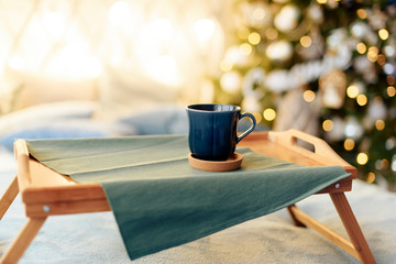 cups with tea on the background of the Christmas tree