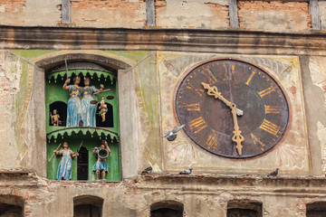 Part of the facade of the clock tower in Sighisoara, Romania
