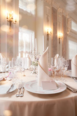 Festive covering table with glasses and gifts