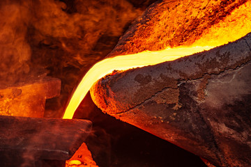 metal casting process with high temperature fire in metal part factory