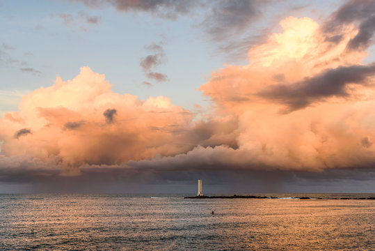 View of Farol de Itacare lighthouse with sea at sunset