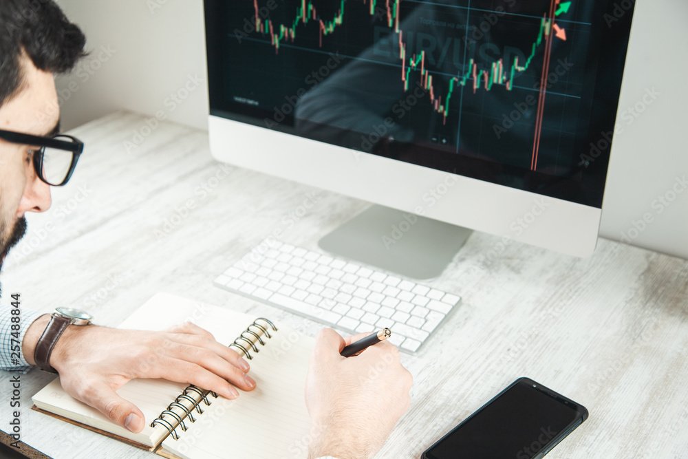 Poster man with trading computer screen background