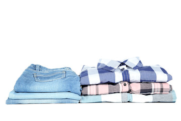 Stack of folded clothes isolated on white background