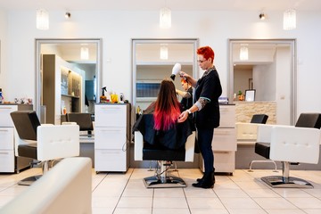 Young woman in hair salon