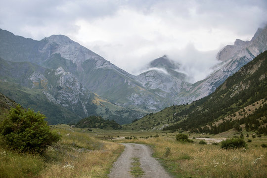 Empty dirt road across Otal Valley, Torla, Huesca, Spain