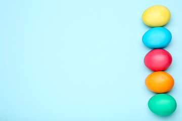 Colorful easter eggs on blue background