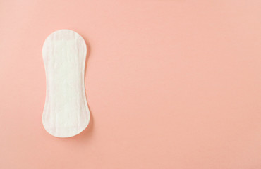 women intimate hygiene products - sanitary pads and tampon on pink background - obrazy, fototapety, plakaty