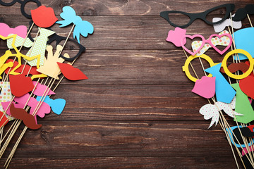 Paper booth props for party on brown wooden table © 5second