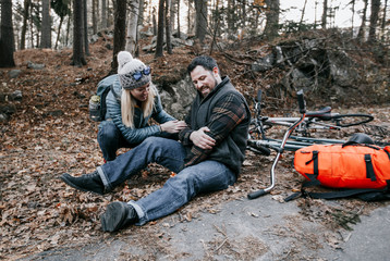 Woman comforting injured man, Portland, Maine,  USA