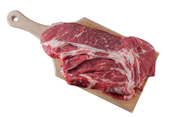 Raw beef meat on cutting board isolated on white background