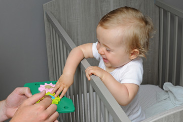 baby playing with toy