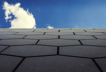 Wall of hexagons under the sky